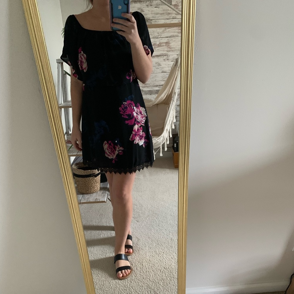 Beautiful black floral mini dress with lace detailing at the bottom.